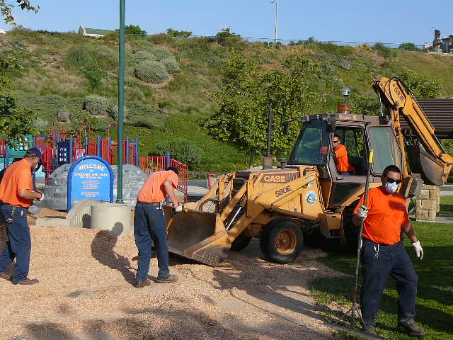 People working on a playground